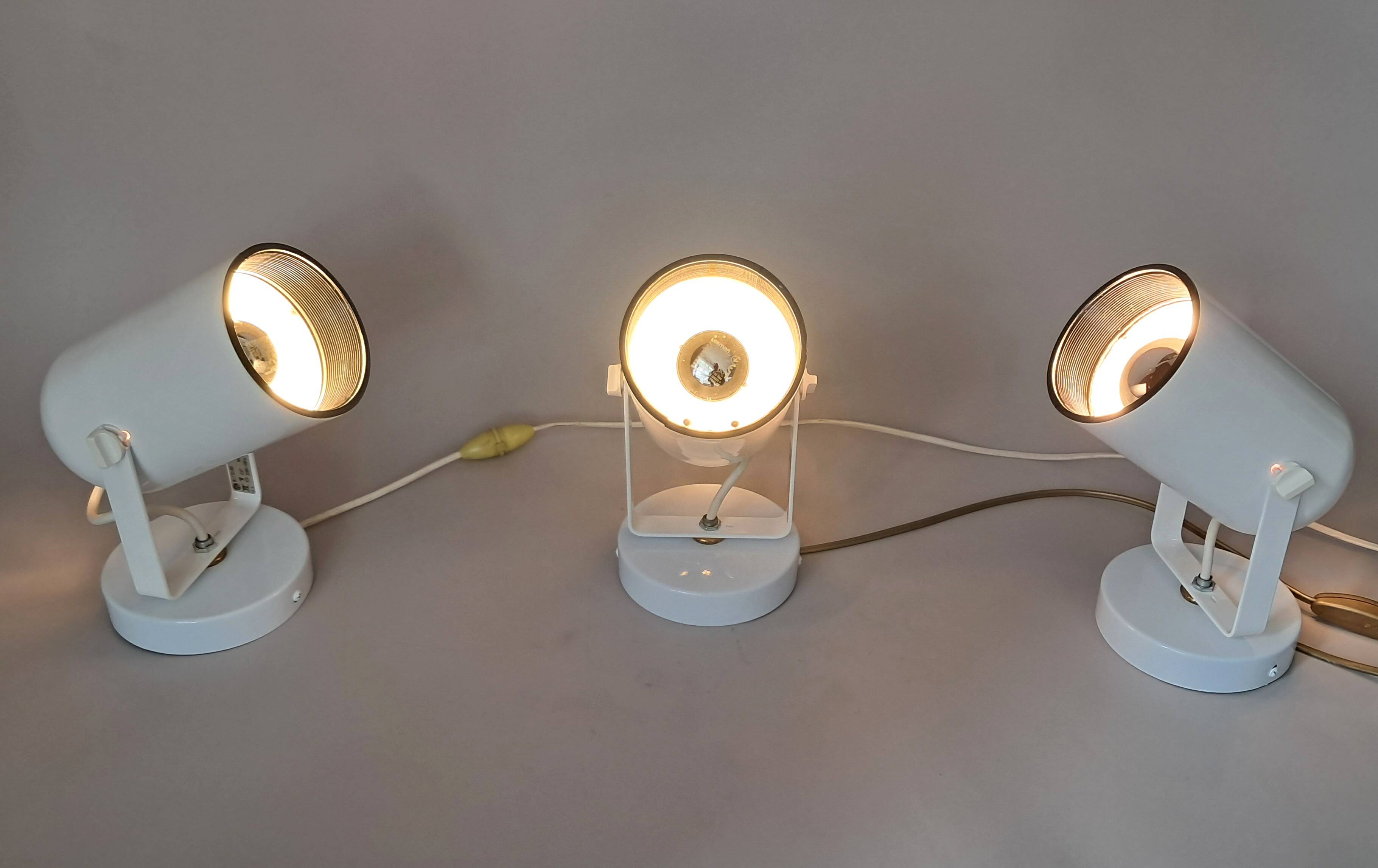 3 white lacquered metal wall lights from the 1970s.