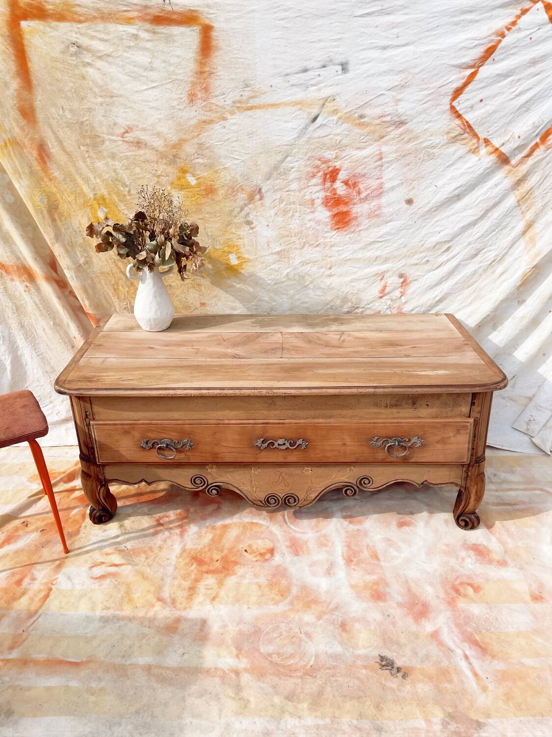 Vintage and rustic TV stand or coffee table in carved raw wood