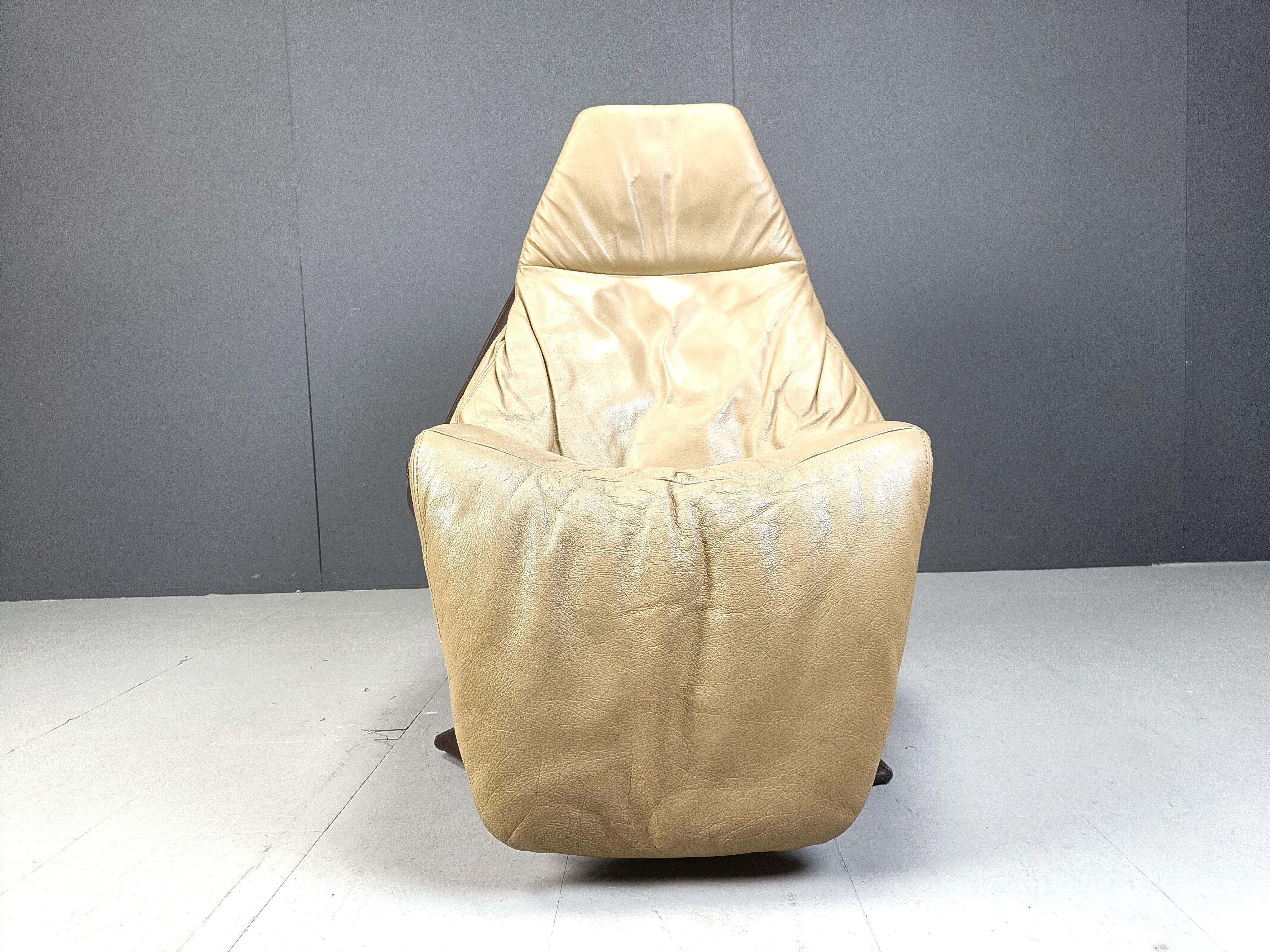 Vintage leather swivel chair with ottoman, 1970s