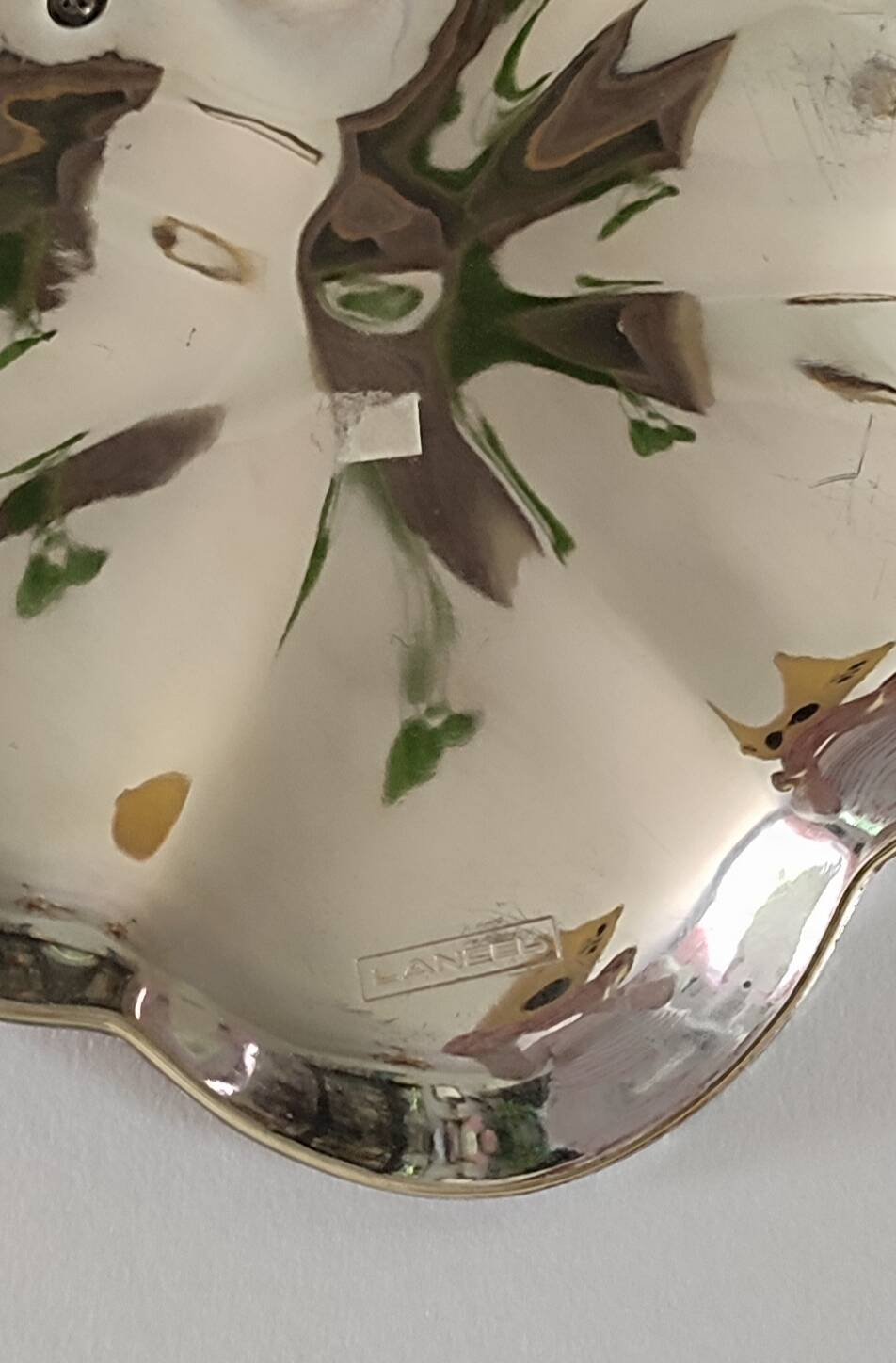 A Lancel pocket tray in silver metal.