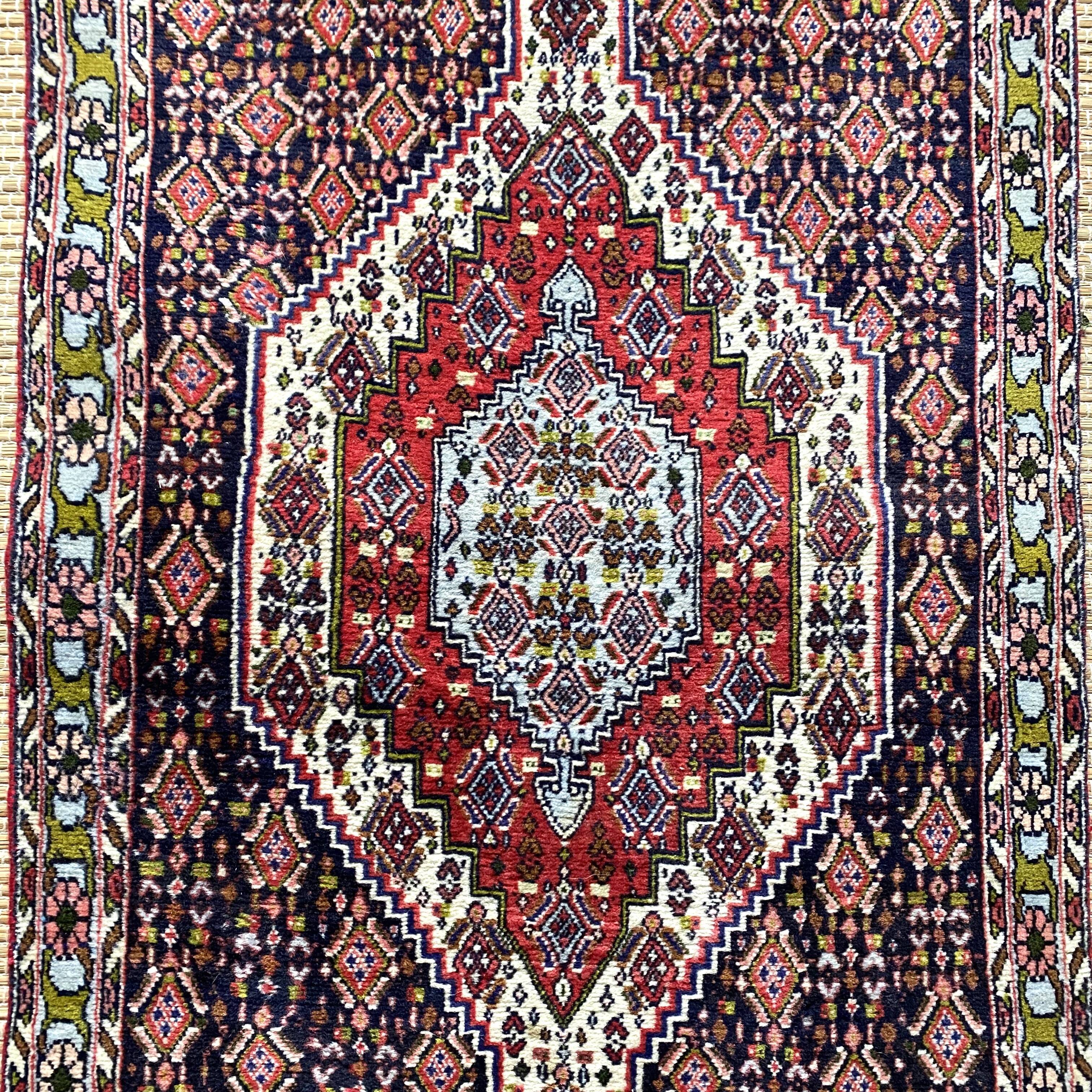 Persian wool carpet 69x113