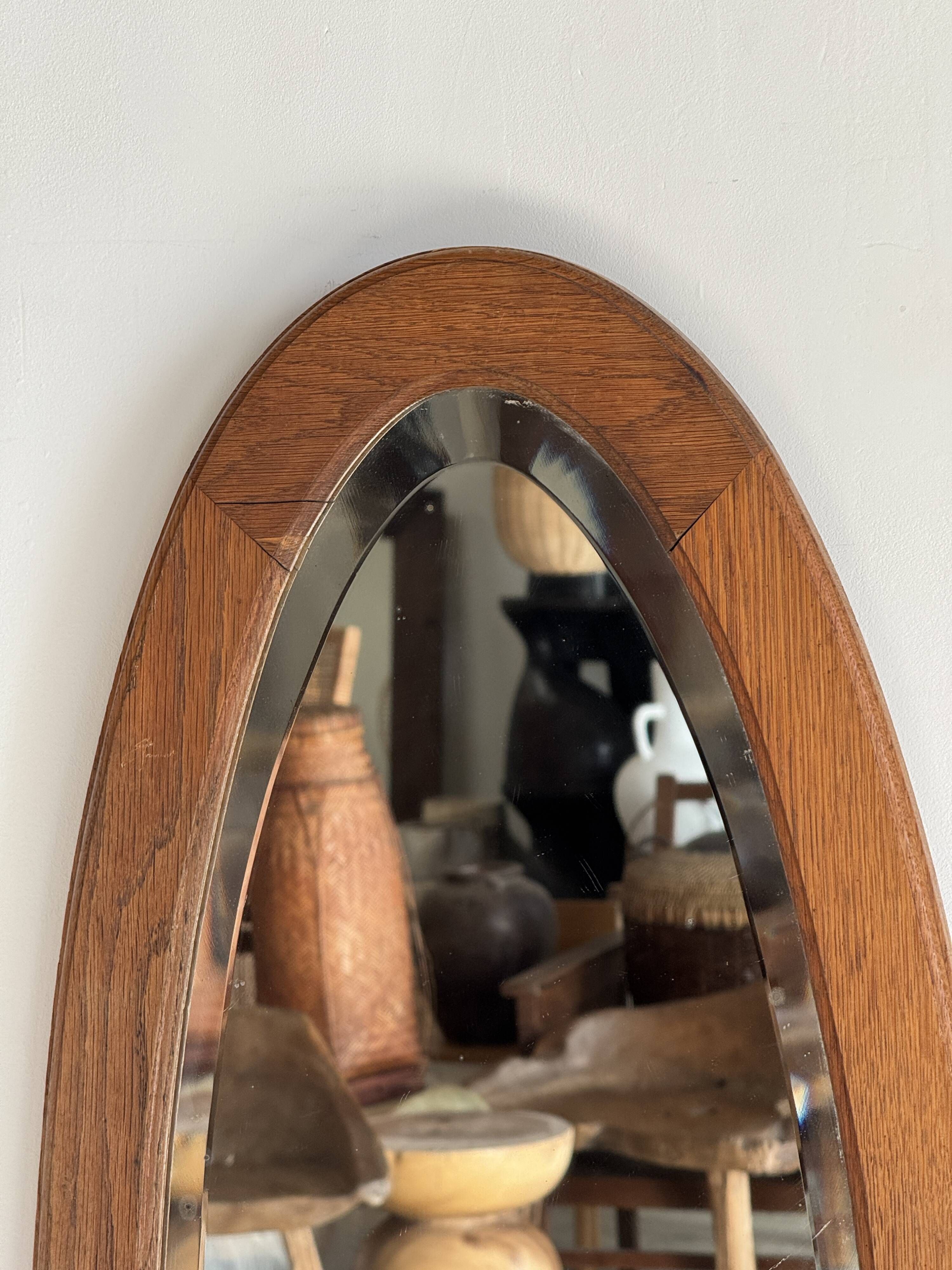 Vintage oval mirror in oak with bevelled glass H120 W43 D2