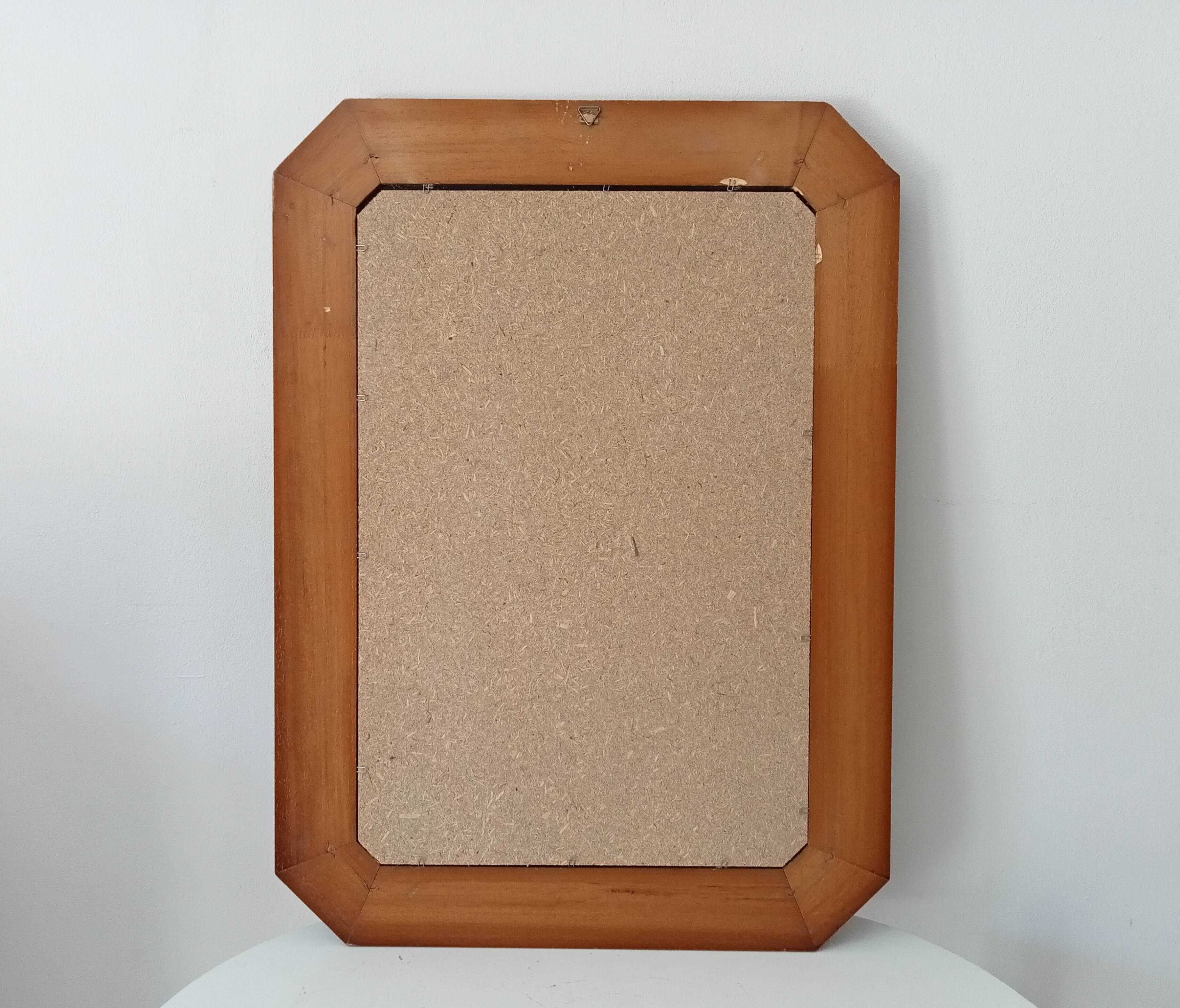 Vintage octagonal bevelled mirror from the 1960s.