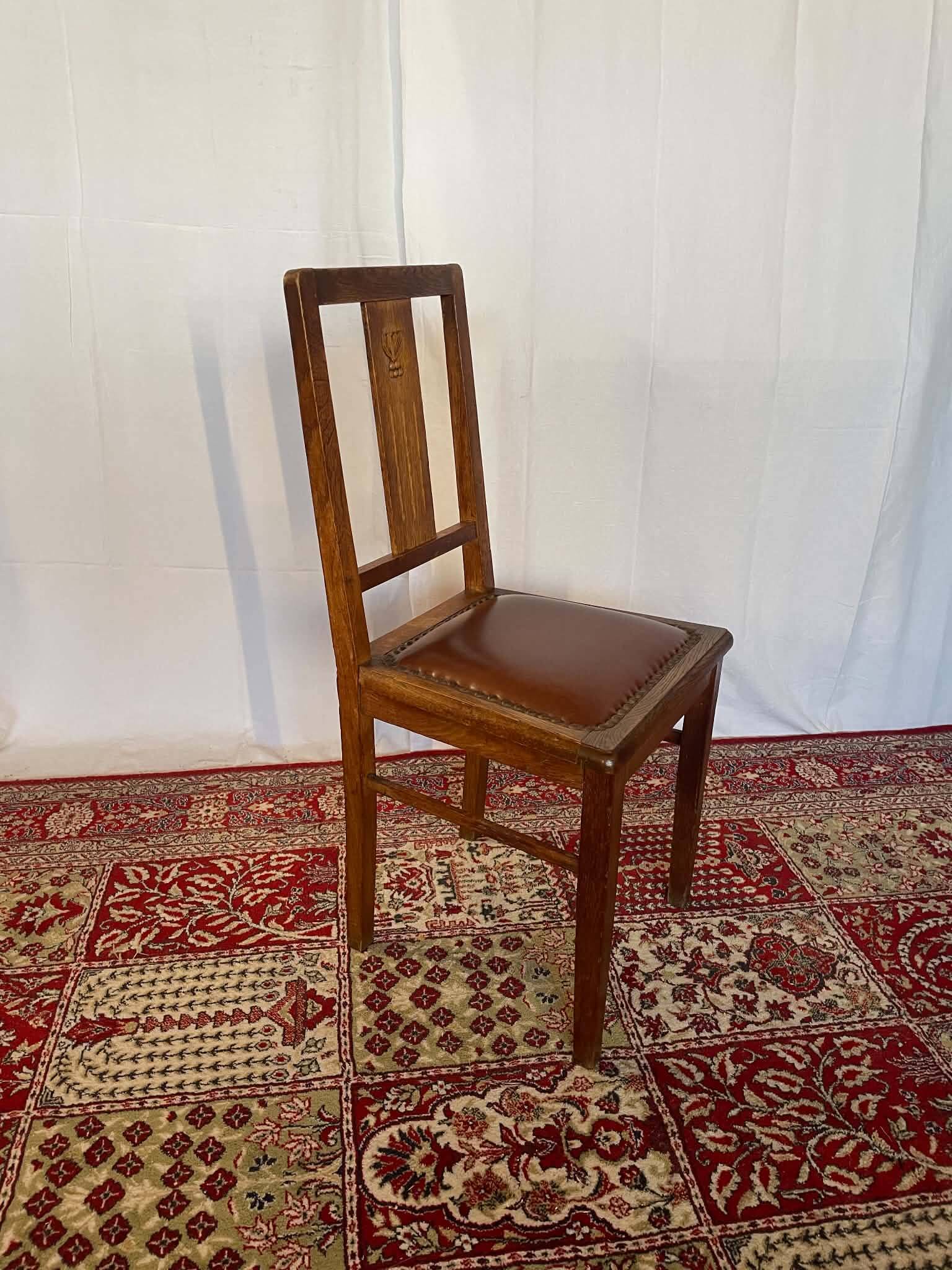 Set of 4 Art Deco chairs in oak and brown leather.