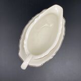 Porcelain sauce boat with black and gold checkered border