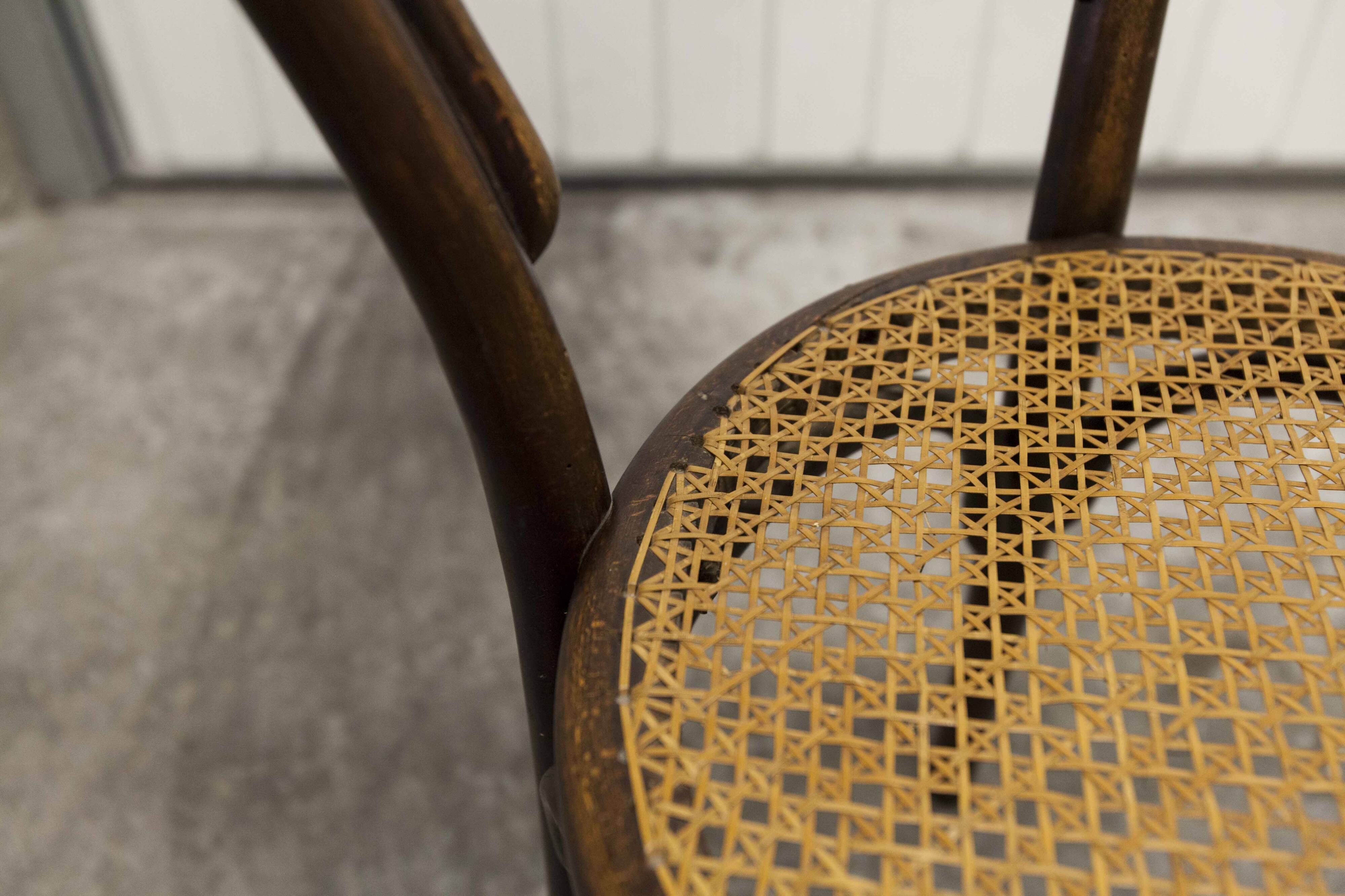 Ungvar Ungarn 1900 dark brown cane bistro chair
