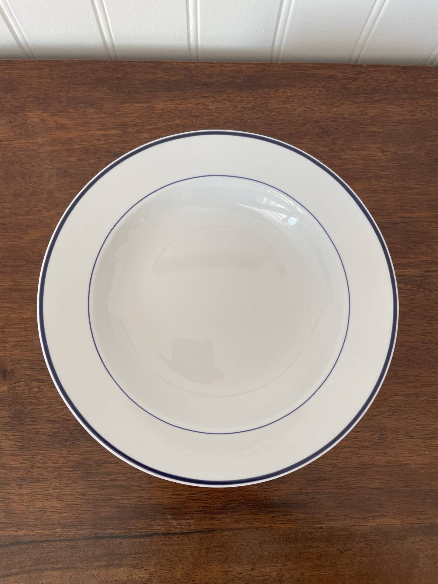 Set of 5 deep porcelain plates from Italy.