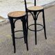 High curved black caned wooden bistro bar stool