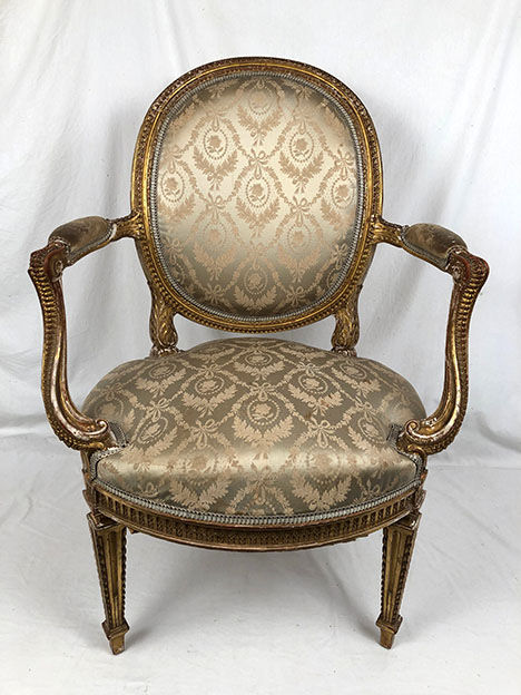 Carved and gilded wooden armchair in Louis XVI style, circa 1900
