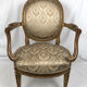 Carved and gilded wooden armchair in Louis XVI style, circa 1900