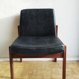 Massive teak and black skai armchair from the 1960s