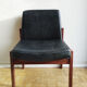 Massive teak and black skai armchair from the 1960s