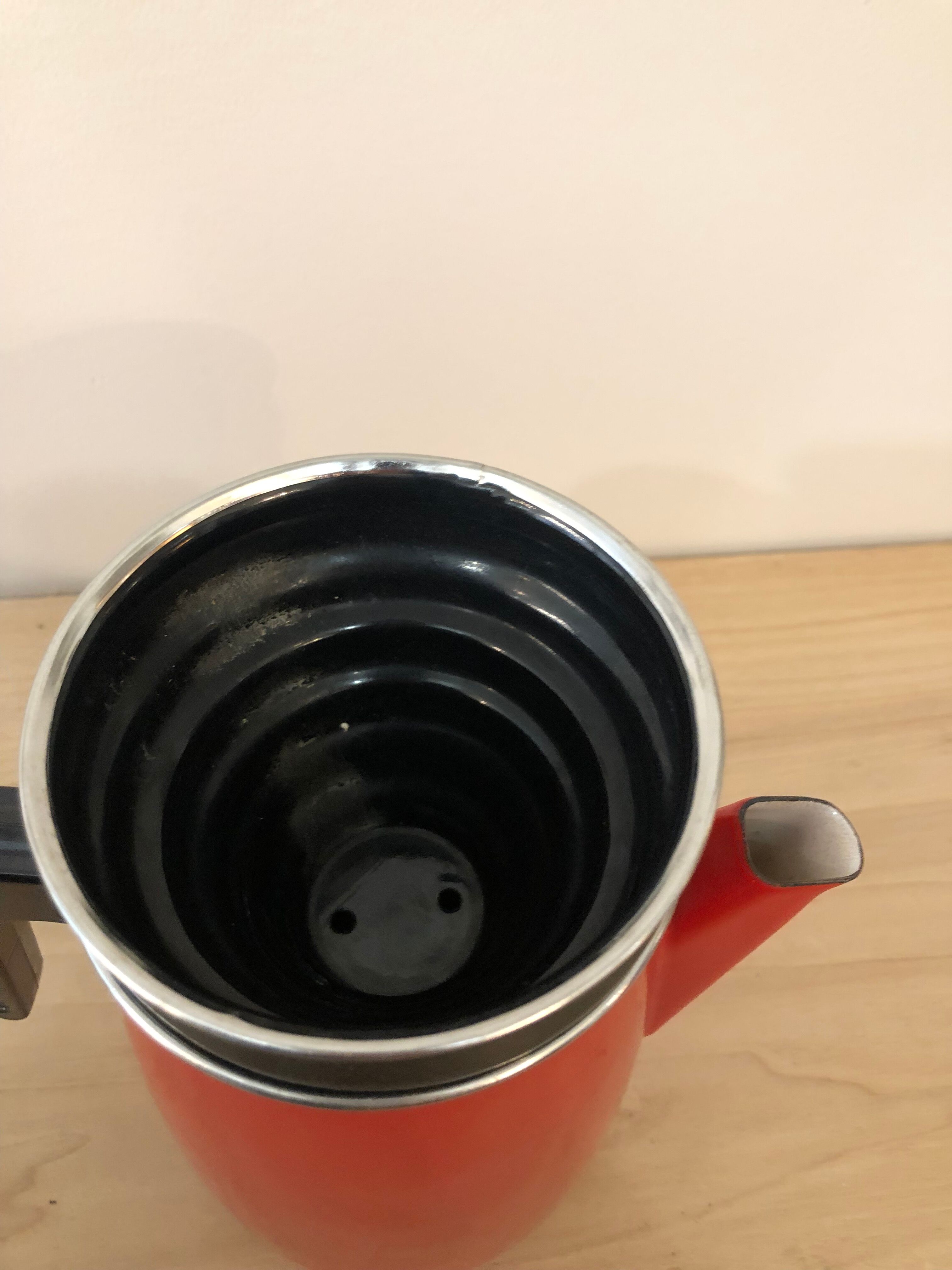 Red enamel coffee maker with filter