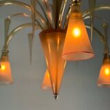 Venetian chandelier in beige/gray murano glass bordered with a red net