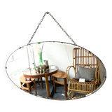 Oval beveled mirror with its chain