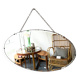 Oval beveled mirror with its chain