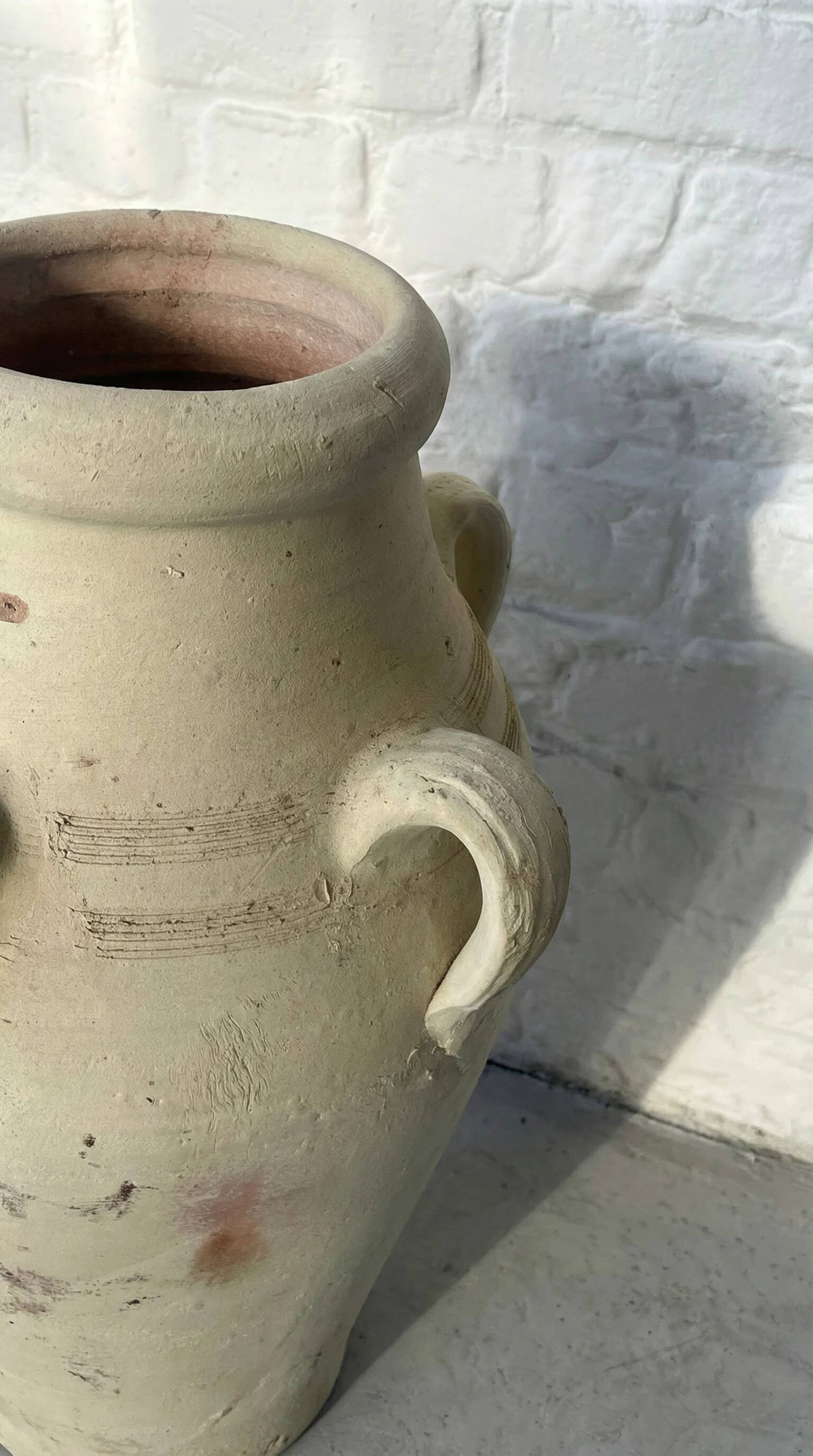 Pair of vintage terracotta amphorae