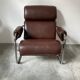 Midcentury tubular chromed chairs with leather cushions