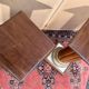 Pair of antique-style columns in solid wood and gilding.