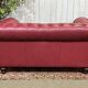 Chesterfield 2-seater leather sofa, modern production from the 2000s.