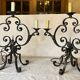Pair of 3-light wrought iron candlesticks on vintage legs