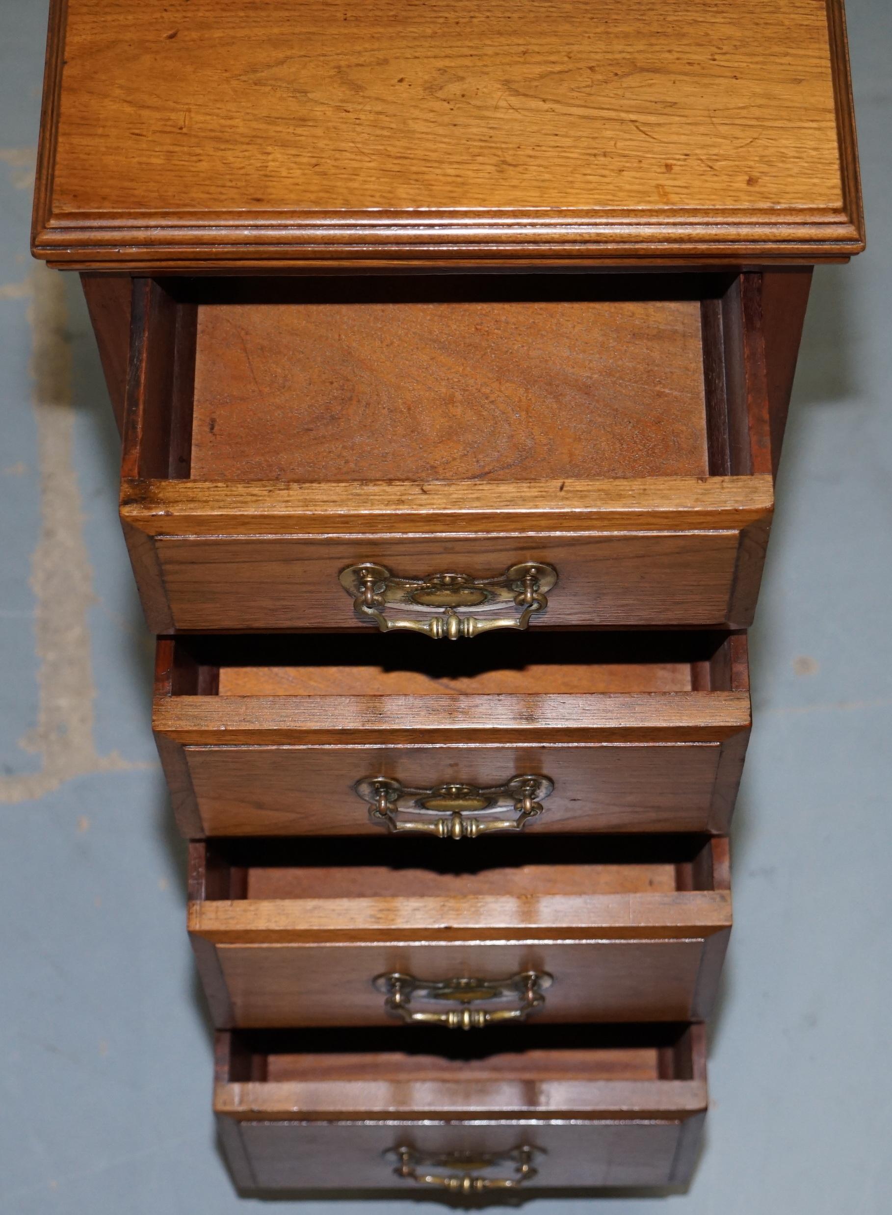 Pair of tall Victorian walnut chests of drawers