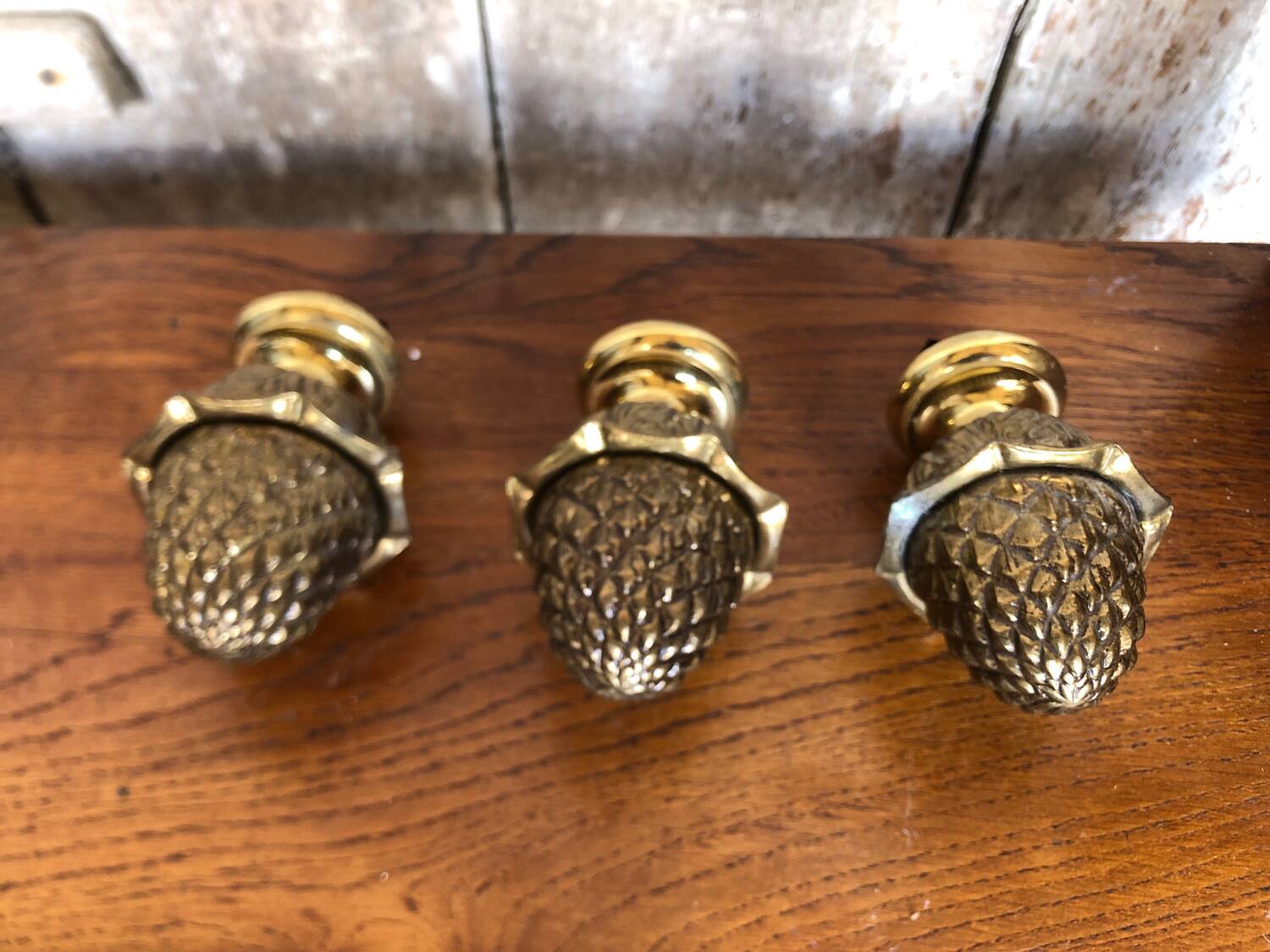 Set of 3 pine cones curtain rod golden bronze