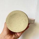 Handmade golden ceramic mug