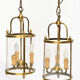 Pair of lanterns with three lights in gilded metal and glass