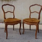 2 old chairs in walnut and velvet