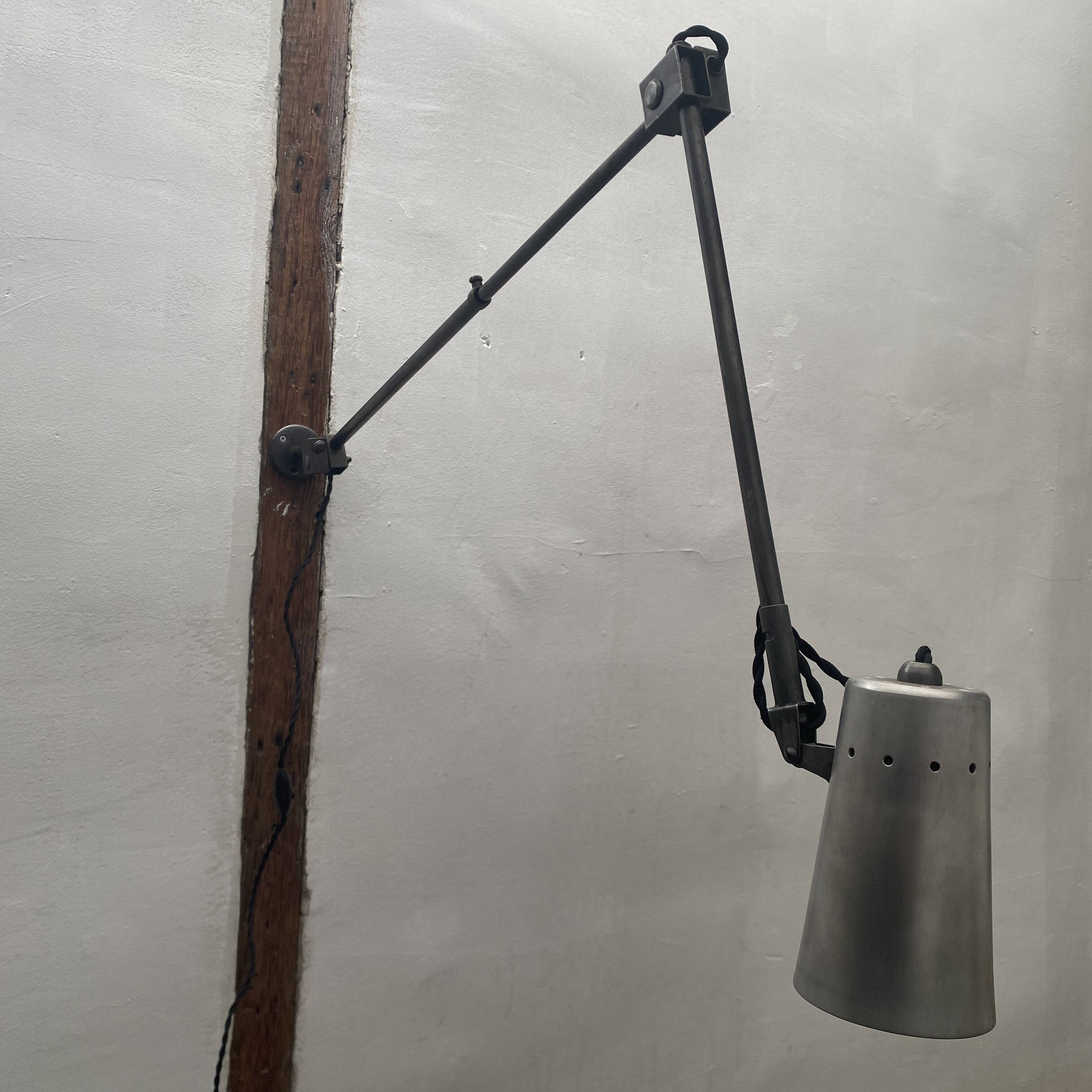 Vintage industrial workshop wall light from the 1950s.