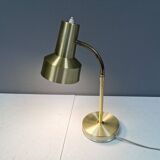 Older Swedish table lamp, estimated 1980s, in gold-colored aluminum with “bend”.