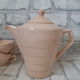 Coffee and tea service in faience of Saint Amand, pink, art deco