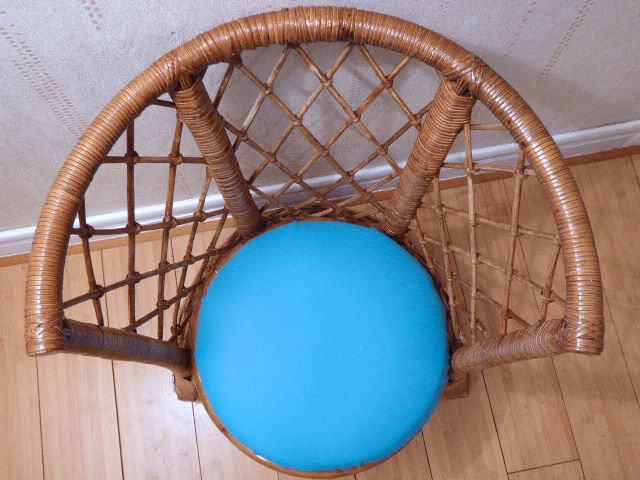 Vintage gold rattan armchair