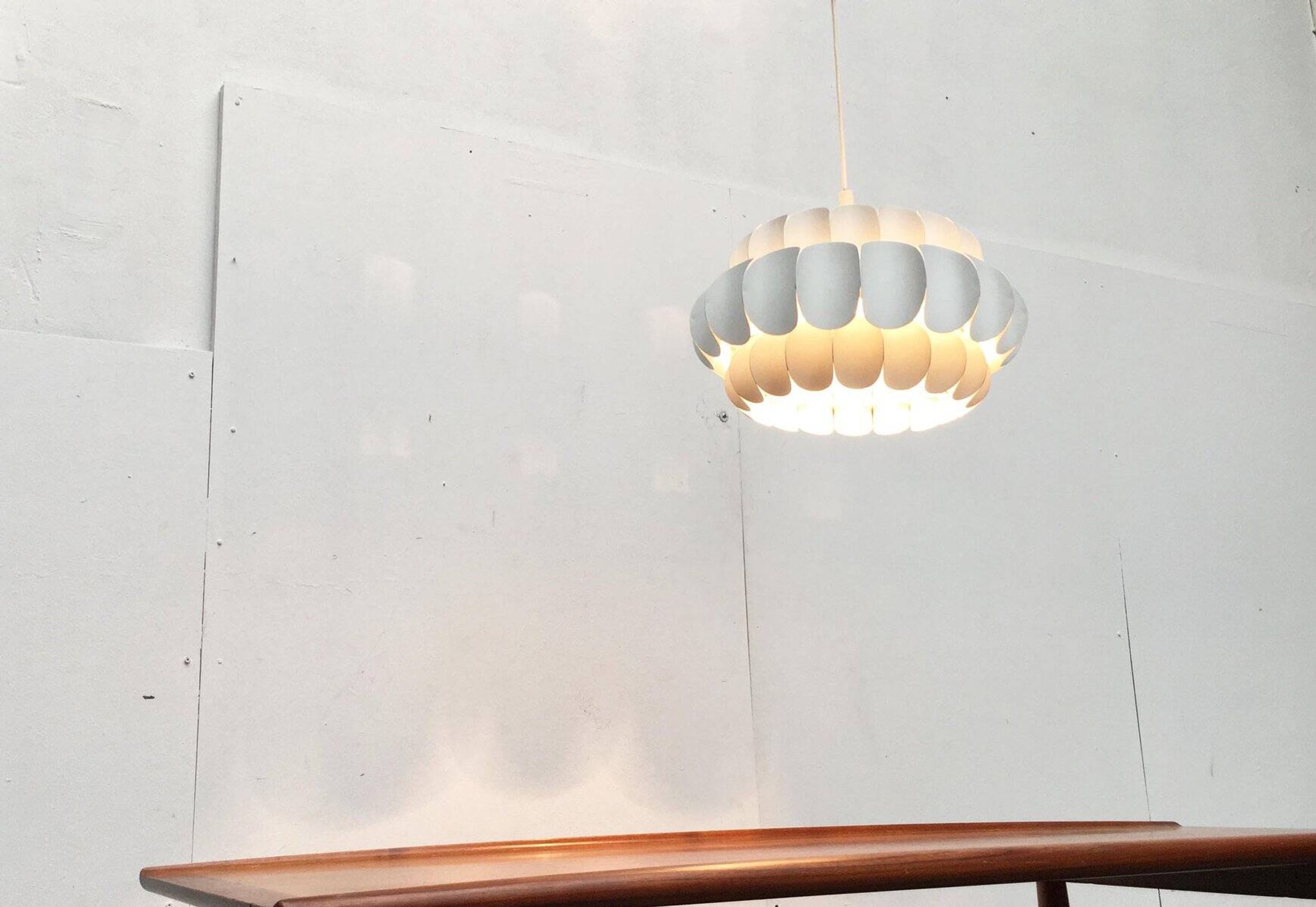 Mid-century white metal Swiss suspension by H. Zender for Temde.