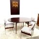 Danish round dining table in rosewood – 1950s design with butterfly extension.