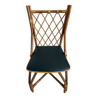 Vintage rattan and imitation leather chair