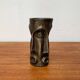 Abstract vase with a brutalist bronze face from the mid-century.