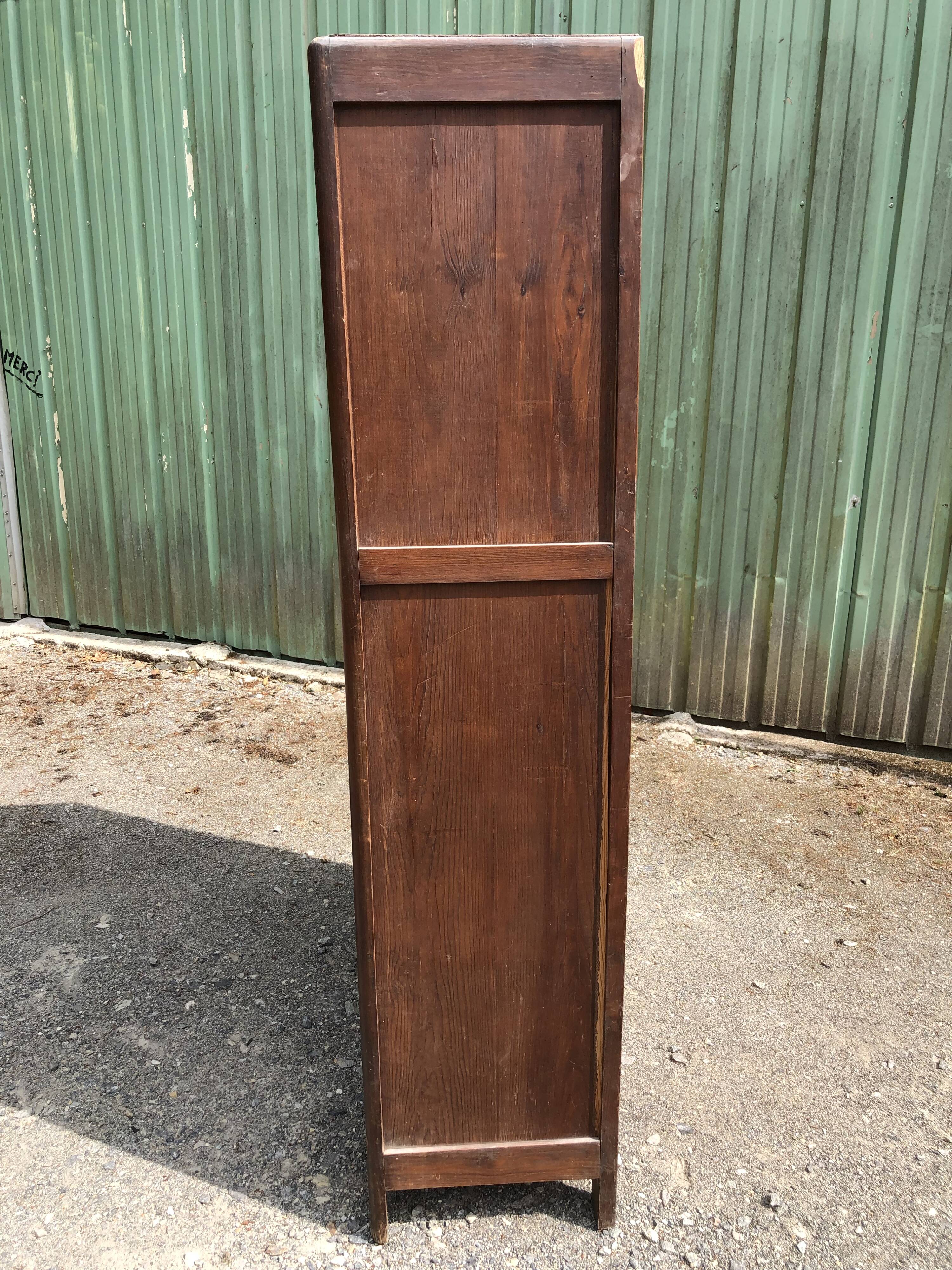 Vintage Parisian pine cabinet.