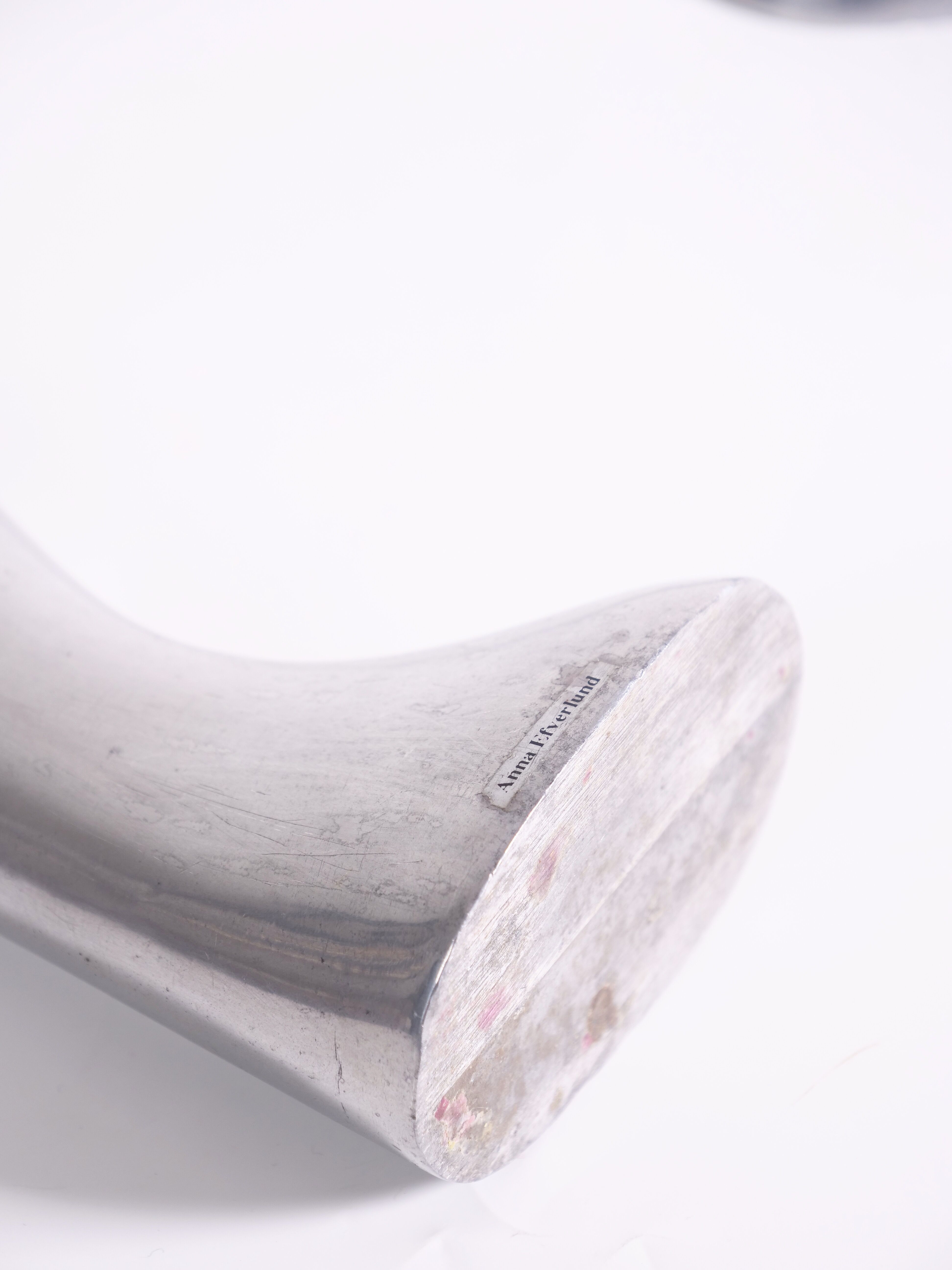 Pair of cast aluminum candle holders by Anna Efverlund