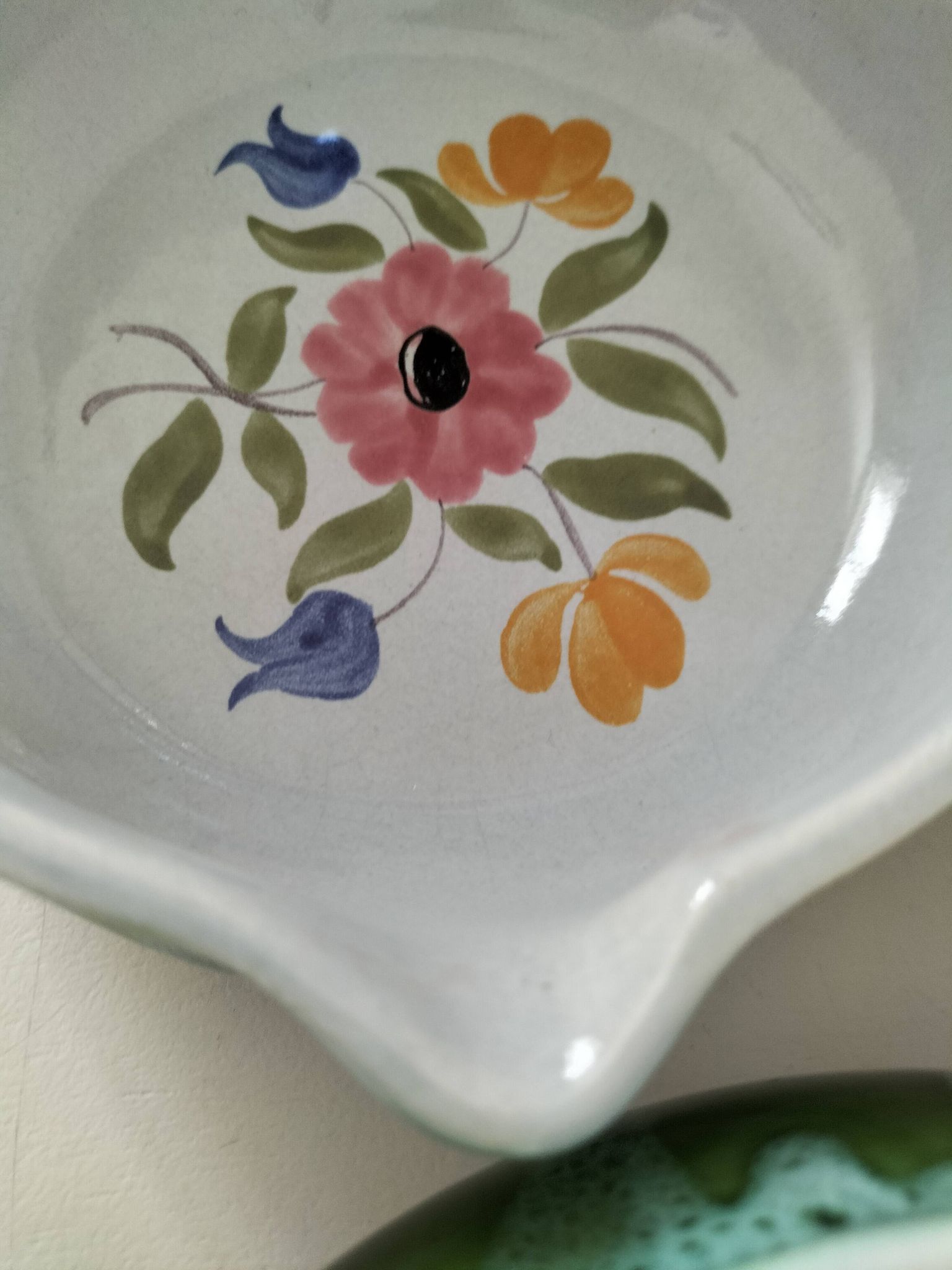 Duo of flowery caquelons