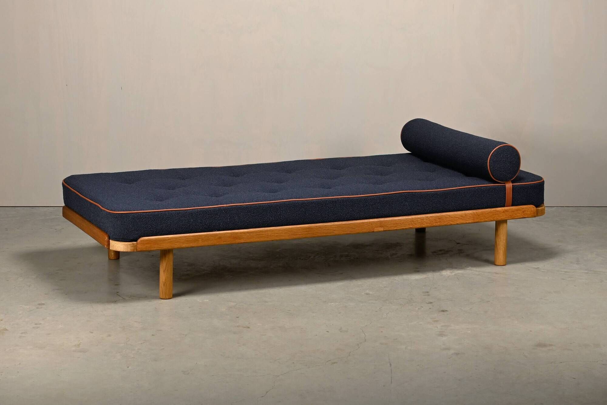 Scandinavian Daybed in Oak and dark Blue bouclé fabric with Leather accents