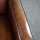 A very beautiful set of 2 Art Deco design armchairs in sheep leather