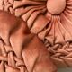 Pair of round vintage pleated velvet cushions