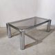 Table basse vintage en chrome et verre fumé