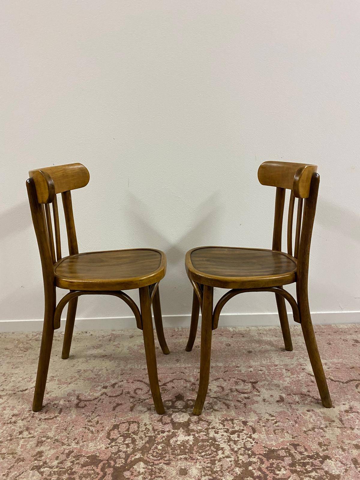 Pair of Baumann bistro chairs