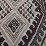 White carpet with multicolored Berber patterns handmade