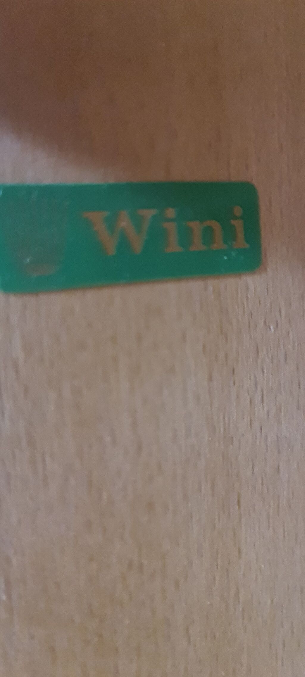 Vintage roll front cabinet by Wini