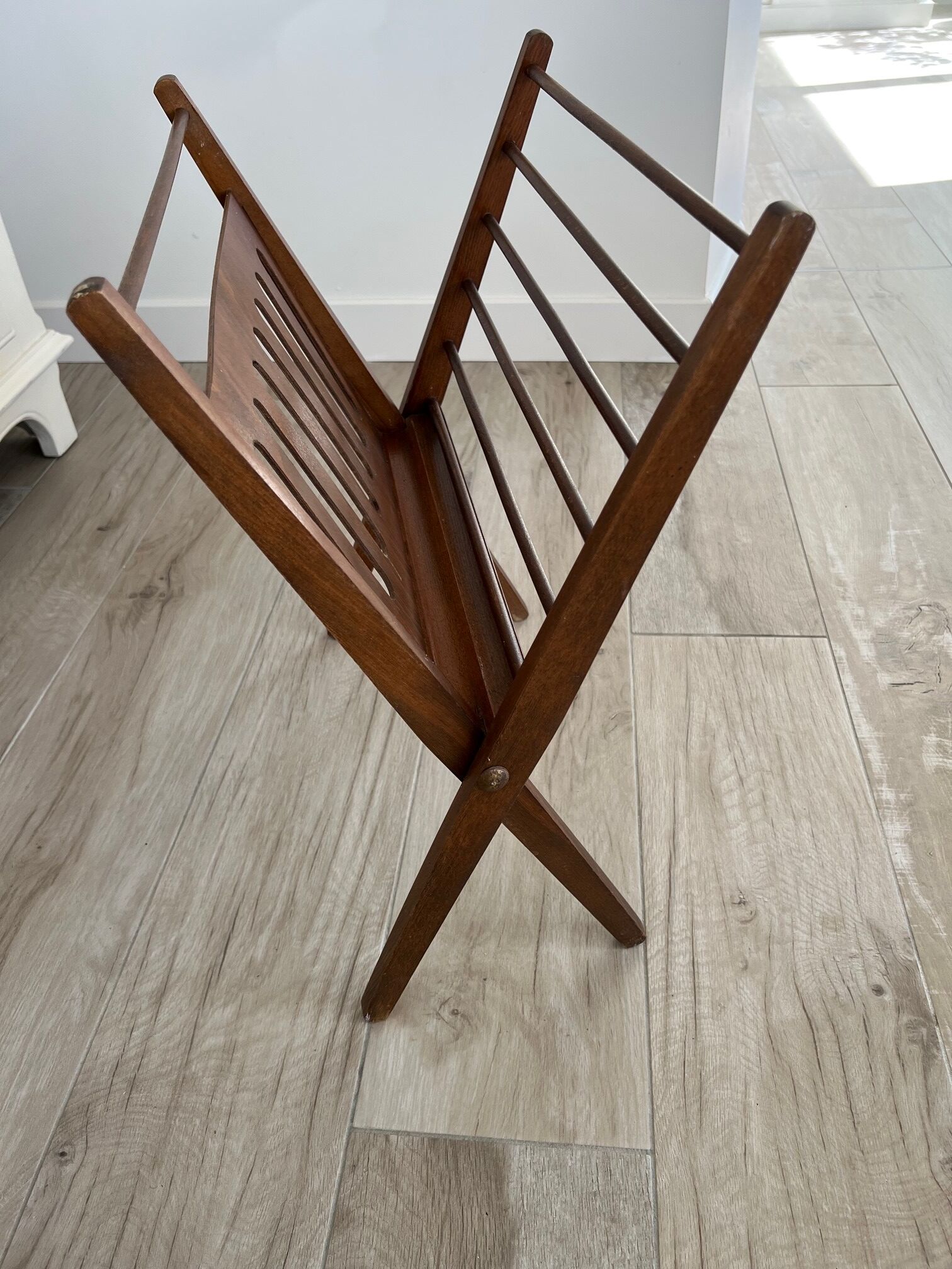 Folding magazine door