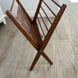 Folding magazine door